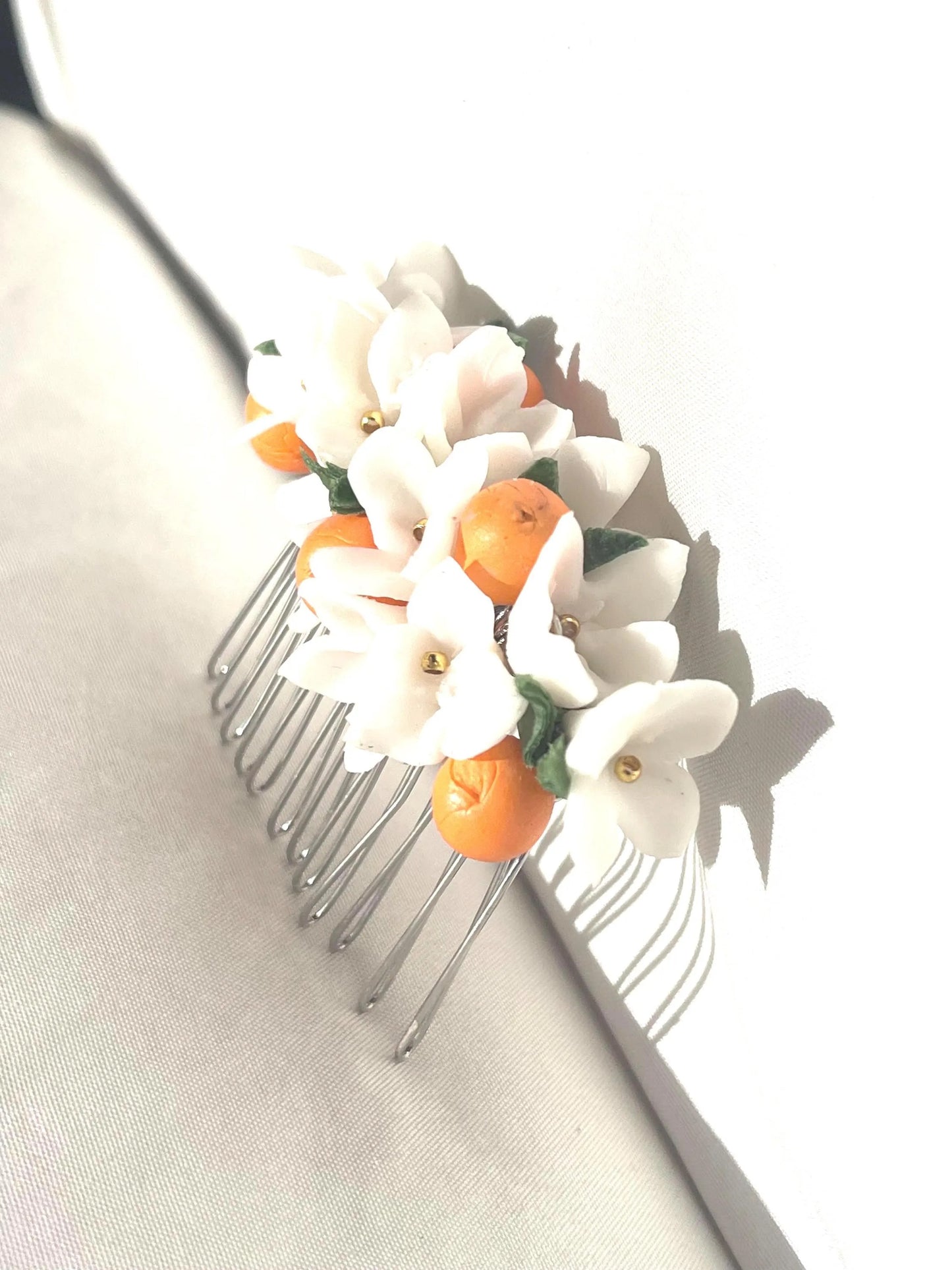 Azahar Orange Blossom Hair Comb – Handmade Spanish Floral Hair Piece with Citrus Oranges – Andalusian Bridal Hair Accessory, hair side.
